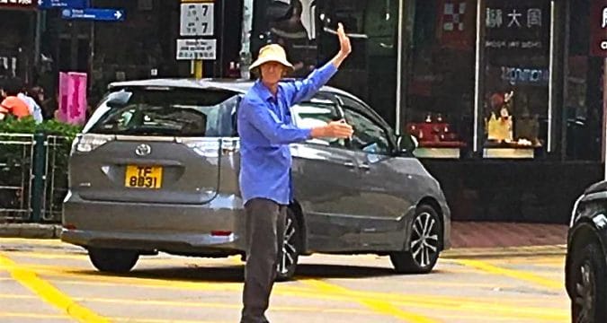 Priest becomes traffic guide to ease chaos