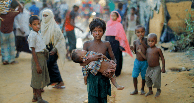 End racism toward refugees Cardinal Bo says