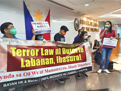 Migrant rights groups protest anti-terror bill