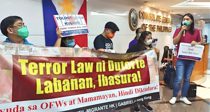 Migrant rights groups protest anti-terror bill