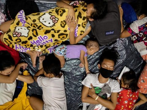Aid efforts hampered by Covid-19 after typhoon barrels through Philippines