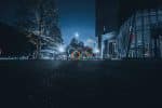 The Olympic rings lit up at night on the streets of Shinjuku near the Japan National Stadium in Tokyo, Japan. Photo: Ryunosuke Kikuno/Unsplash