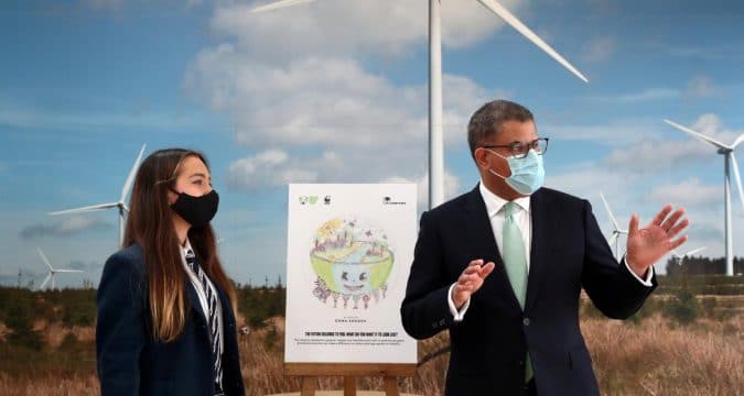 Alok Sharma, president of the United Nations Climate Change Conference [COP26], with Emma Khadeh, winner of the Creative Earth art competition, during an event at the Whitelee wind farm, near Glasgow, Scotland, on May 14. Photo: CNS/Russell Cheyne, Reuters group