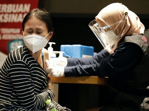Dialogue needed to address vaccine hesitancy, Vatican official says