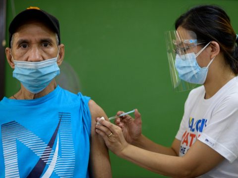 Philippine labour groups urge faster vaccine drive