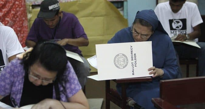 Philippine bishops deny meddling in politics