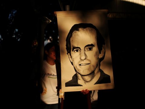 El Salvador charges former president with 1989 murders 