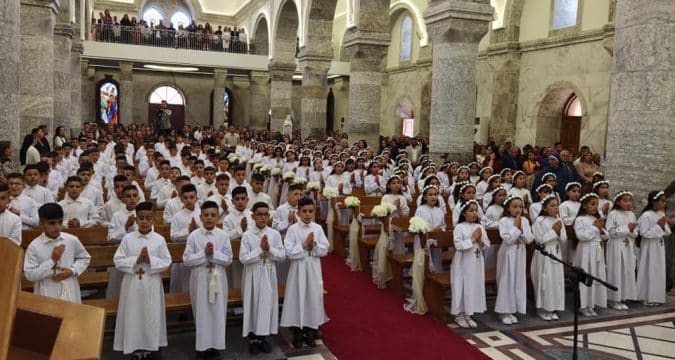 Children in Qaraqosh receive First Holy Communion