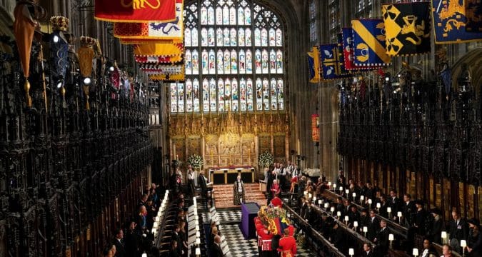 Cardinal praying at queen’s funeral signals openness to dialogue