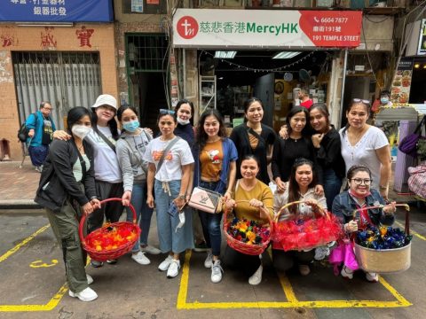 Sharing Easter eggs along Temple Street