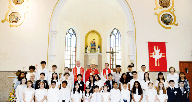 First communion and confirmation at Rosary Church