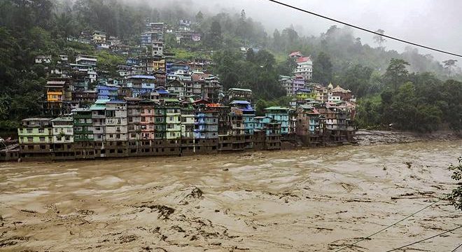 Dead and missing after flash floods in India’s eastern Himalayas