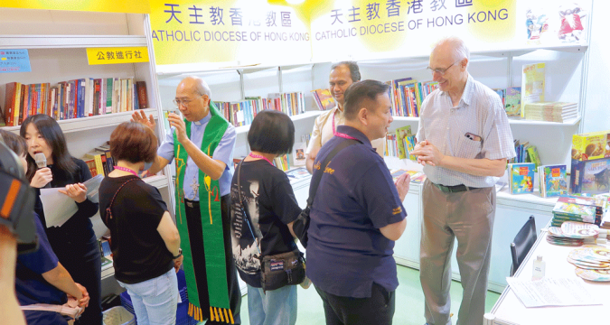 Receive book fair visitors with enthusiastic hearts Bishop Ha urges