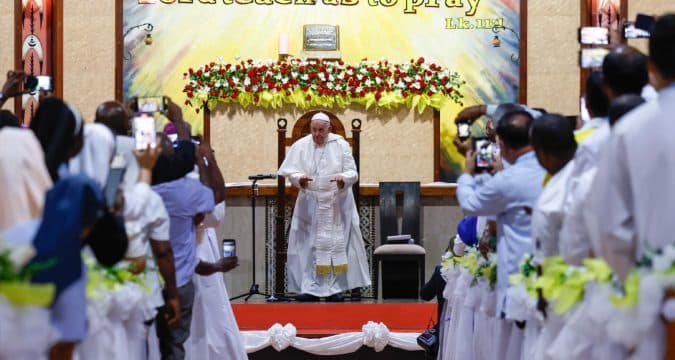 Pope speaks of refuge for Aung San Suu Kyi, and warns against clericalism