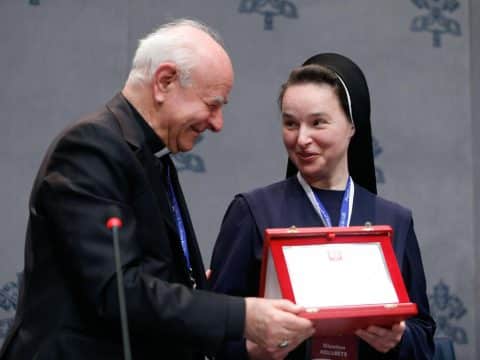 Only a united global family can fix crises, archbishop says