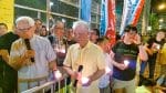 Left to right: Cardinal Zen, Reverend Chu, Lee Wing-tat and Tommy Cheung during a candlelight vigil outside the Lai Chi Kok Reception Centre on April 24.