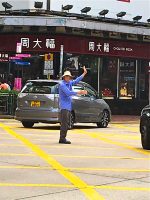 Priest becomes traffic guide to ease chaos