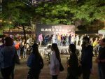 People lined up to pay floral tribute in memory of Alex Chow Tse-lok.