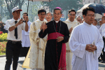 Archbishop Nguyen greets people in front of Notre Dame Cathedral, Ho Chi Minh City, on December 11. Photo: UCAN