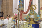 Bishop Dialogo sheds tears before the image of Our Lady of Peñafrancia during his episcopal ordination at Manila Cathedral on December 12. Photo: UCAN/Roy Lagarde