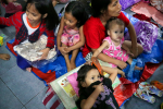 A displaced family at an evacuation centre in Manila, the Philippines, on December 3. Photo: CNS/Reuters