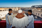Above: Pope Francis delivers his Christmas urbi et orbi (to the city and the world) blessing from the central balcony of St. Peter's Basilica on December 25. Photo: CNS/Vatican Media