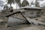 A home blanketed in volcanic ash in Laurel in Batangas, the Philippines, following the eruption of the Taal volcano. Photo: CNS/Reuters