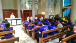 Cardinal Tong addresses the mission ambassadors on December 14.
