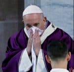 Pope Francis uses a handkerchief during Ash Wednesday Mass at the Basilica of Santa Sabina in Rome Feb. 26, 2020. (CNS photo/Remo Casilli, Reuters)