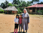 Sister Rosa Elena Pico, a member of the Missionaries of Mary Co-Redemptrix, with children from the indigenous community of Sarayaku, Ecuador, in September 2019. Photo: CNS