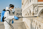 A worker sanitises the Ponte della Paglia off of St. Mark’s Square in Venice, Italy, on March 12. Photo: CNS/Reuters
