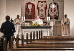 A priest celebrates Holy Thursday Mass via livestream on April 9, at a nearly empty church in Bonn, Germany. Photo: CNS/KNA