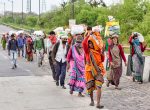 Migrant workers in India walk along a road to return to their villages during a nationwide lockdown to limit the spreading of Covid-19 on March 26. Photo: CNS photo/Reuters