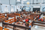 Evacuated families take shelter at Our Lady of the Pillar Church in Pilar, in Sorsogon, after being forced out of their homes by Typhoon Vongfong. Photo: UCAN/ courtesy of Father Treb Futol
