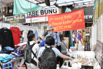 The booth in Temple Street set up by MercyHK and Father Wotherspoon.
