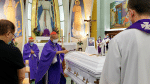 Cardinal Tong (holding the aspergillum), with Cardinal Zen, sprinkling holy water on Audrey Donnithorne’s coffin at St. Joseph’s Church on June 26. Photo: Annie Lam