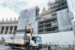 Workers remove scaffolding from the final restored section of the colonnade in St. Peter’s Square. File photo: CNS