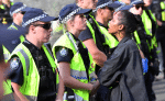 A protester confronts police during a Black Lives Matter protest in Brisbane, Australia, on June 17. Photo: CNS /AAP Image via Reuters