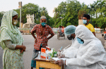 Poor people visit a volunteer group for free medical services in Dhaka during the nationwide shutdown over the Covid-19 pandemic. Photo: UCAN/Piyas Biswas