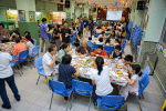 A free meal gathering at Our Lady of Rosary Church, Kennedy Town.