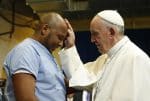 Pope Francis blesses a prisoner as he visits the Curran-Fromhold Correctional Facility in Philadelphia, the United States in September 2015. File photo: CNS