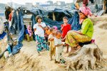 A Rohingya family outside their tent at a refugee camp in Cox's Bazar, Bangladesh. Photo: CNS/EPA
