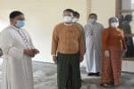 Cardinal Bo, left, and Yangon chief minister, Phyo Min Thein, visit a quarantine facility in Thanlyin township on October 3. Photo: UCAN/Myanmar Catholic bishops' social communication office