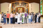 Catechumens and catechists of Lok Yung Yung Catechism Class celebrate the re-opening of class with a Mass on October 17.