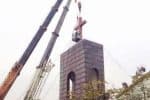 Authorities tear down a cross from a Protestant church in Hangzhou's Dingqiao township, in December 2014. File photo: UCAN/courtesy of China Aid