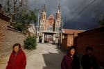 Villagers near the Catholic church in the village of Huangtugang, Hebei province, China. File photo: CNS/Reuters