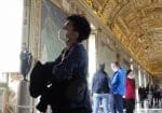 A visitor wearing a mask for protection from Covid-19 tours the Vatican Museums in February. Photo: CNS