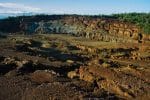 An abandoned open-pit mine on Manicani island in the central Philippines remains without vegetation many years after its closure. Photo: UCAN/Mark Saludes