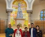 Andrew Lam, left, with Father Rojas, his mother, elder brother and niece.
