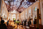 Police examine the devastation after the bombing of St. Sebastian Church in Negombo, Sri Lanka, on 21 April 2019. Photo: CNS/Reuters